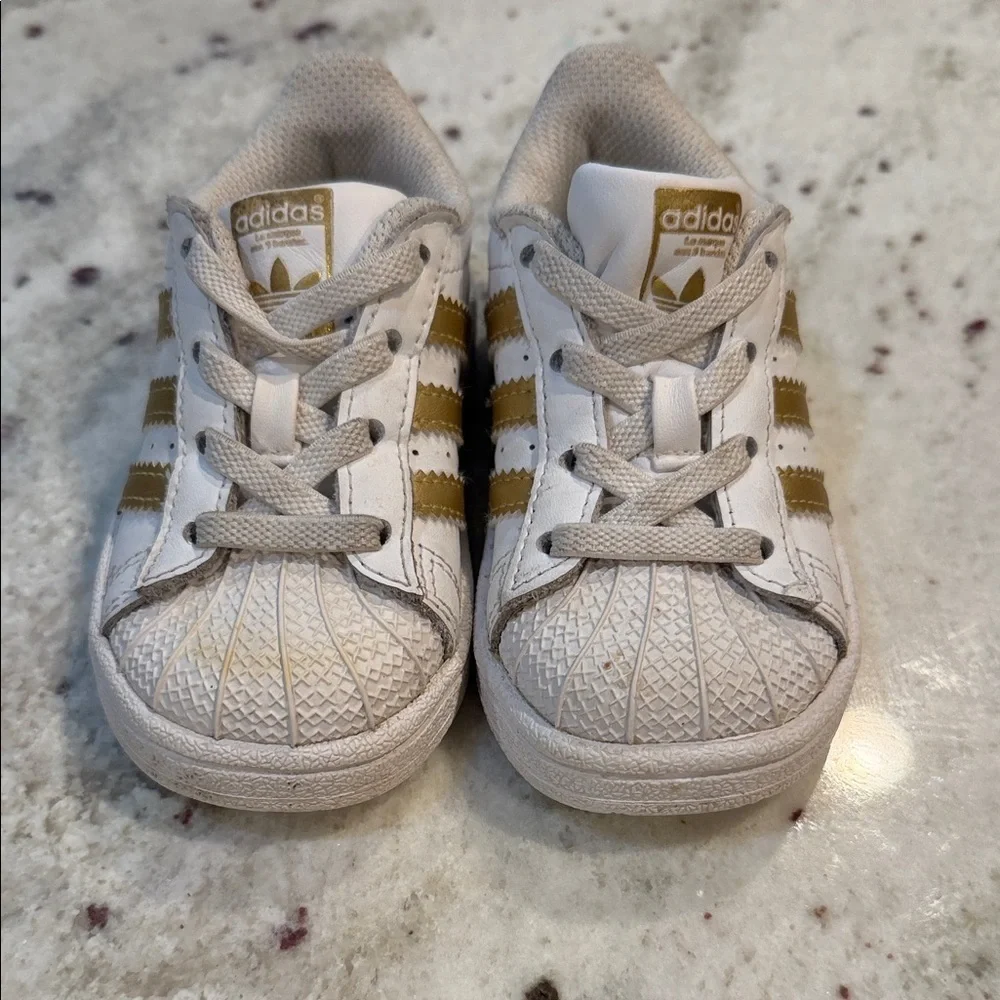Adidas Superstars Kids' White and Gold Striped Sneakers